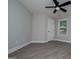 Bedroom with light grey walls, a ceiling fan and white trim at 328 Brookstone Dr, Carrollton, GA 30116