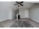 Bonus room with a ceiling fan, light grey walls and white trim at 328 Brookstone Dr, Carrollton, GA 30116