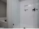 New, tiled shower with niche and glass doors at 328 Brookstone Dr, Carrollton, GA 30116