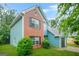 Beautiful two-story home with brick and siding, a well-kept lawn, dark shutters, and an attached garage at 4753 Klondike Cv, Lithonia, GA 30038