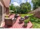 Expansive backyard deck provides a generous space for outdoor living and entertaining with multiple seating options and lush greenery at 130 Bexar Ct, Johns Creek, GA 30022