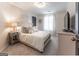 Cozy bedroom with plush carpet, a soft upholstered bed, and neutral tones for a relaxing atmosphere at 130 Bexar Ct, Johns Creek, GA 30022