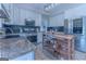 Well-appointed kitchen with white cabinets, stainless steel appliances, and granite countertops at 130 Bexar Ct, Johns Creek, GA 30022