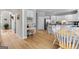 Spacious kitchen with adjacent office nook and dining area at 495 Stonehaven Dr, Fayetteville, GA 30215