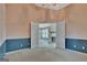 Spacious bedroom featuring soft, neutral colors and an entryway, creating a serene and inviting atmosphere at 316 Kensington Dr, Peachtree City, GA 30269