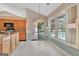 Bright kitchen nook featuring large windows with views to the pool and access to the porch at 316 Kensington Dr, Peachtree City, GA 30269