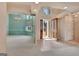 Open-concept foyer showcasing the transition to the living spaces and adjacent dining room at 316 Kensington Dr, Peachtree City, GA 30269