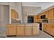 The kitchen offers ample cabinetry, granite countertops, and modern appliances at 316 Kensington Dr, Peachtree City, GA 30269