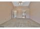 Main bedroom featuring carpet floors and access to the main bathroom at 316 Kensington Dr, Peachtree City, GA 30269