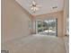 Main bedroom with sliding glass doors to a patio and a view of the water at 316 Kensington Dr, Peachtree City, GA 30269
