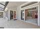 Spacious patio with views of the dining room, kitchen, and access to the backyard at 316 Kensington Dr, Peachtree City, GA 30269