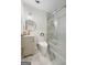 Renovated bathroom with marble flooring and glass enclosed shower at 9477 Forest Knoll Dr, Jonesboro, GA 30238