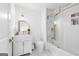 Modern bathroom featuring a glass-enclosed shower, vanity, and marble floors at 9477 Forest Knoll Dr, Jonesboro, GA 30238