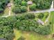 Aerial view of a home and property with large wooded surrounding at 1041 Sandy Ridge Rd, Mcdonough, GA 30252
