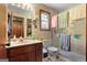 Bright bathroom with a shower and a beautiful granite vanity at 292 Selfridge Rd, Mcdonough, GA 30252