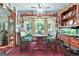 Quaint dining room with unique decor, vintage lighting, and window views at 292 Selfridge Rd, Mcdonough, GA 30252