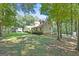 A charming home with a lush lawn and mature trees at 292 Selfridge Rd, Mcdonough, GA 30252
