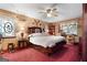 Cozy bedroom with vintage decor, soft lighting, and plush bedding at 292 Selfridge Rd, Mcdonough, GA 30252