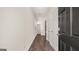 Welcoming entryway with hardwood floors and neutral paint at 12071 Conrad Cir, Hampton, GA 30228