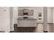 Modern kitchen with stainless steel appliances, granite counters, and ample storage space at 12071 Conrad Cir, Hampton, GA 30228