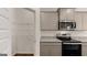 Well-designed kitchen with stainless steel appliances and a spacious pantry at 12071 Conrad Cir, Hampton, GA 30228