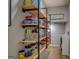 Organized pantry with custom wooden shelving and storage baskets, perfect for storing food and supplies at 403 Chester Piper Rd, Covington, GA 30014