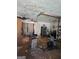 Spacious unfinished basement with ceiling damage, offering potential for renovation and customization at 8778 Homewood Ct, Riverdale, GA 30274