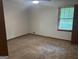 Bedroom with carpet, neutral walls and natural light, creating a comfortable and relaxing environment at 2202 Springdale Dr, Snellville, GA 30078