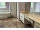 Bathroom with large vanity, garden tub, and good lighting at 145 Windy Ridge Ct, Fayetteville, GA 30214