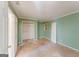 Standard bedroom featuring a window and closet; ready for complete renovation at 145 Windy Ridge Ct, Fayetteville, GA 30214