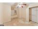 Standard bedroom with ceiling fan and closet; ready for complete renovation at 145 Windy Ridge Ct, Fayetteville, GA 30214