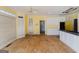 Bright kitchen space with white cabinets, a window, and potential for renovation at 145 Windy Ridge Ct, Fayetteville, GA 30214