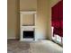 Living room highlighting fireplace, mantle, and natural light at 145 Windy Ridge Ct, Fayetteville, GA 30214
