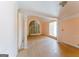 Living room featuring archways, light-colored walls and trim ready for renovation and personalization at 145 Windy Ridge Ct, Fayetteville, GA 30214
