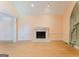 Spacious living room featuring a fireplace and elegant trim details around the room at 145 Windy Ridge Ct, Fayetteville, GA 30214