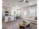 Open-concept living space with kitchen, dining area, and cozy living room at 11555 Kimberly Way, Hampton, GA 30228