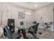 Dining room showcasing a glass table, black chairs, and modern speaker system at 1848 Eastmore Ave, Conyers, GA 30094