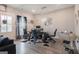 Modern dining room featuring a glass table, black chairs, and stylish decor at 1848 Eastmore Ave, Conyers, GA 30094