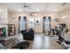 Bright living room with hardwood floors, neutral walls and ceiling fan at 1848 Eastmore Ave, Conyers, GA 30094