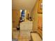 Stylish bathroom featuring a vanity with marble countertop and a decorative accent chair at 45 Surrey Chase Dr, Social Circle, GA 30025