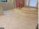 Large bathroom with soaking tub, tile flooring, and natural light at 45 Surrey Chase Dr, Social Circle, GA 30025