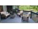 Relaxing outdoor deck area with comfortable seating and serene lake views at 45 Surrey Chase Dr, Social Circle, GA 30025