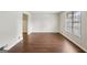 Bright living room featuring lots of natural light and hardwood floors at 1517 Indian Forest Trl, Stone Mountain, GA 30083