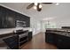 Kitchen with dark cabinets, stainless steel appliances and view to deck through french doors at 949 Amelia Rd, Locust Grove, GA 30248