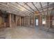 Unfinished basement showcasing wooden framing and exposed beams, ready for customization at 949 Amelia Rd, Locust Grove, GA 30248