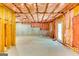 Unfinished basement showing insulation and concrete walls awaiting customization at 121 Wellbrook Circle Ne, Conyers, GA 30012