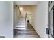 Inviting entryway with hardwood floors, staircase, and a view of the fireplace at 121 Wellbrook Circle Ne, Conyers, GA 30012