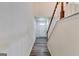 Bright entryway featuring hardwood flooring, a staircase, and fresh, neutral paint at 121 Wellbrook Circle Ne, Conyers, GA 30012