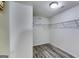 Walk-in closet with built-in shelving for optimal storage at 121 Wellbrook Circle Ne, Conyers, GA 30012