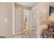 Bright hallway with view of bath and bedroom; detailed trunk accent at 20 Knollwood Pl, Covington, GA 30014